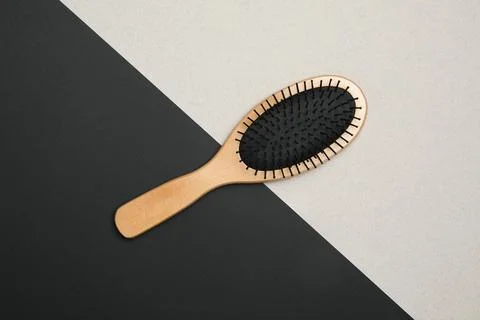 Modern hair brush on color background, top view Stock Photos