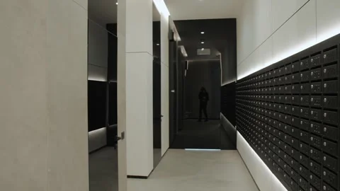 A Modern Hallway featuring Stylish Mailboxes and a Sleek, Sophisticated Design Vídeos de archivo 282094894