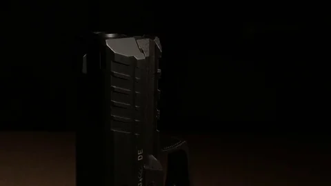 Modern Handgun in low light key Stock-Footage 80660705