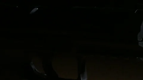 Modern Handgun in low light key Stock-Footage 80660810