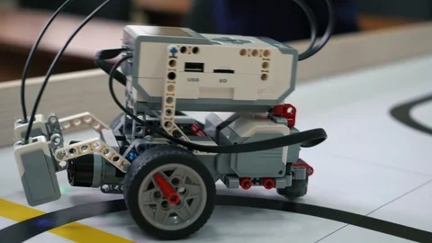 Modern handmade vehicle robot for competitions riding on the track Vidéo 108440729