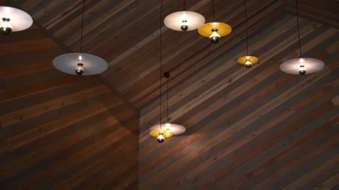 Modern hanging lights interior slow camera pan stylish ceiling design Stock Footage 194791328