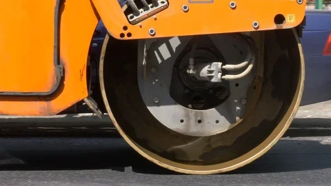 Modern heavy asphalt roller that stack and press hot asphalt. Stock Footage 111141987
