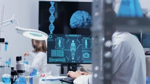 In modern high end laboratory two colleagues are talking about samples Stock Footage 111011557