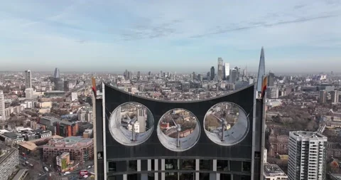 Modern high rise building with wind turbines producing sustainable energy Stock Footage 170917565