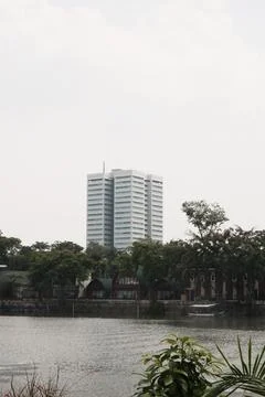 Modern High Rise Tower Overlooking Lake at Senayan Park Jakarta Stock Photos
