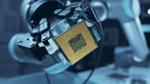 Modern High Tech Authentic Robot Arm Holding Contemporary Super Computer CPU Stock Footage 105364353