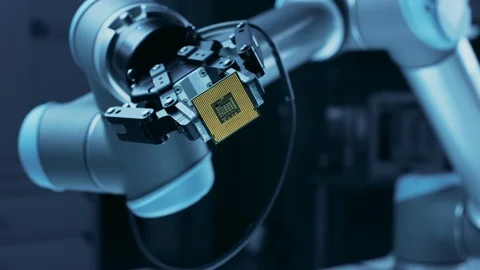 Modern High Tech Authentic Robot Arm Holding Contemporary Super Computer CPU Stock Footage 105364700