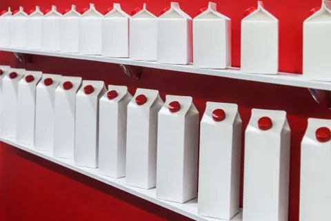 Modern high-tech cardboard packaging for milk, juice and other beverages Foto stock