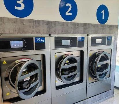 Modern High-Tech Washing Machine Control Panel with Blue Digital Display Stock Photos