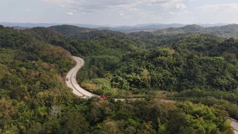 Modern Highway Cutting Through Ancient Tropical Mountains Stock Footage 327507653