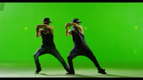 Modern Hip-Hop dancers dancing in masks. On Green screen. Stock Footage