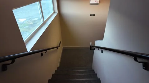 Modern Home Interior with Elegant Staircase Design Stock Footage 256506366