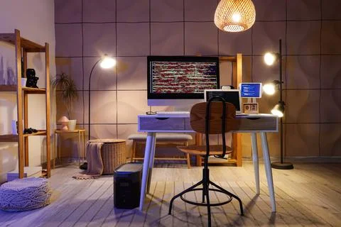Modern home office with computer coding setup Stock Photos