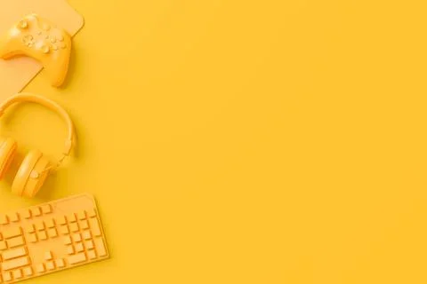 Modern home office setup featuring keyboard, gaming controllers and headphone イラスト素材