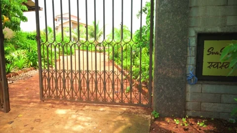 Modern home path leads through green lawn entry Stock Footage 304848003