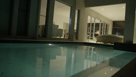 Modern Home Poolside View at Night in Sunshine Coast, Queensland, Australia Stock Footage 341314453