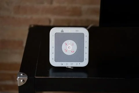 Modern home security control panel displaying smart alarm system Stock Photos