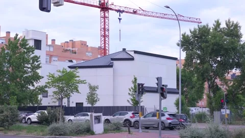 Modern House Construction Site and Tower Crane in Madrid, Spain Stock-Footage 336301107