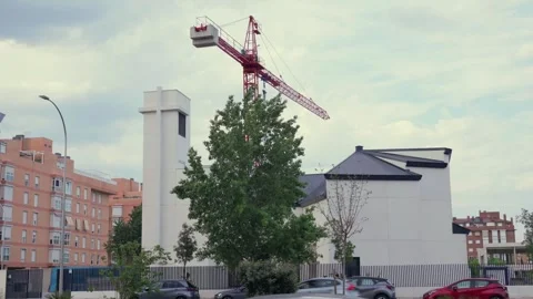 Modern House Construction Site and Tower Crane in Madrid, Spain Stock Footage 336301108