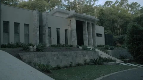 Modern House Exterior Surrounded by Trees on Sunshine Coast in Queensland Austra Stock Footage 341314127