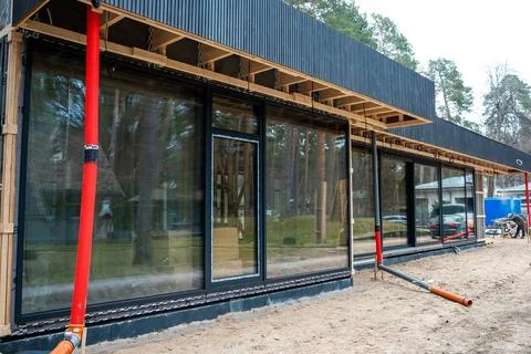 Modern House Under Construction with Ventilation System Installation Stock Photos