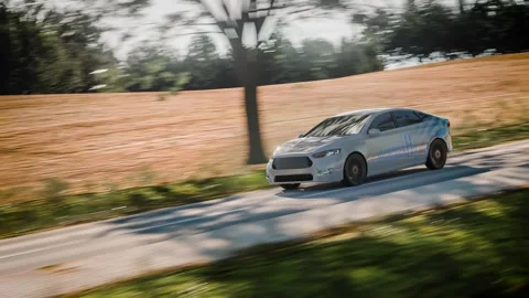 A modern hydrogen-powered car in motion, driving on a scenic road. A perfec.. Stock Footage 290851352