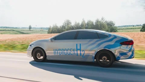 A modern hydrogen-powered car in motion, driving on a scenic road. A perfec.. Stock Footage 290897505
