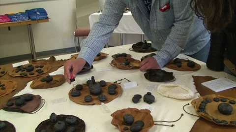 Modern icelandic shaman performs old Norse ritual with stones Stock Footage 37321192