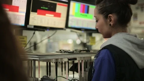 Modern Industrial footage. Workers producing electronic domestic equipment Stock Footage
