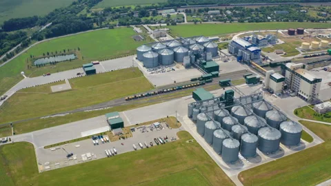 Modern industrial grain elevator storages. Aerial view of big factory  Stock Footage 160497975