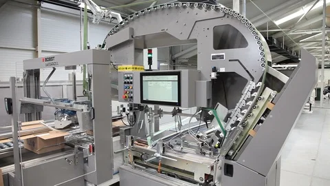 Modern industrial packaging machine Stock Footage 93749465