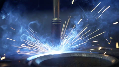 Modern Industrial Robot welding machine active in factory. Automation welding Stock Footage 130766523