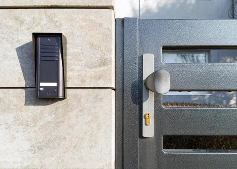 Modern Intercom and Secure Metal Gate with Lock Foto stock