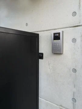 Modern Intercom System on Concrete Wall Stock Photos