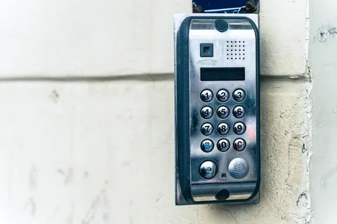 Modern Intercom System Mounted on House Wall for Secure Access Stock Photos