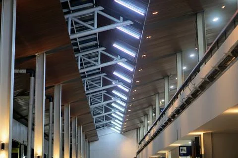 Modern interior architectural design showcasing wooden panel ceiling, steel roof Stock Photos