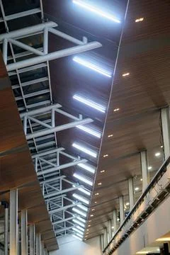 Modern interior architectural design showcasing wooden panel ceiling, steel roof Stock Photos