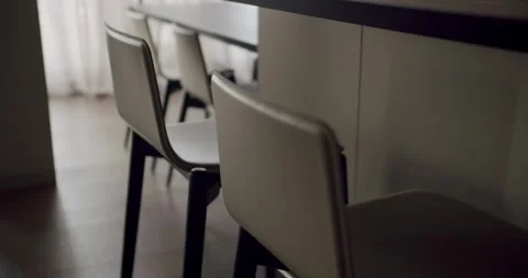Modern Interior Design Featuring Elegant Dining Chairs and Table Stock Footage 344857936