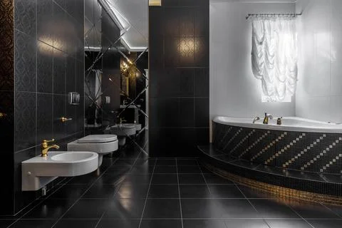 Modern interior design of a large bathroom in a private house Stock Photos