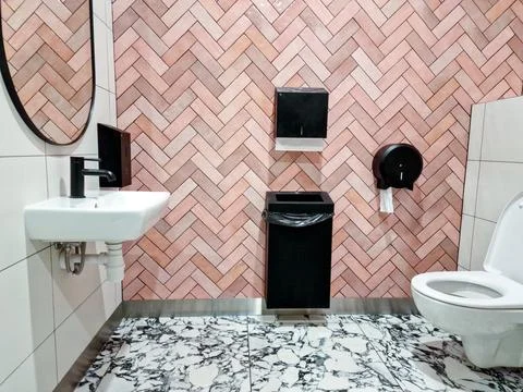 Modern interior design public toilets for mothers and babies in shopping mall Stock Photos