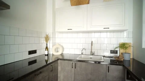 Modern interior design. Smooth shot of kitchen with white tiles Stock Footage 223929645