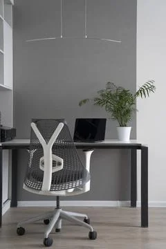 Modern interior of office space with daylight. Computer work place with mod.. Stock Photos