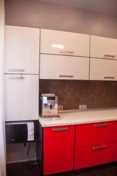 Modern Interior red white kitchen, with metal Stock Photos
