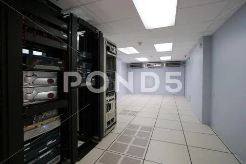 Modern interior of server room in datacenter Stock Photos
