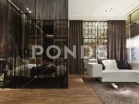 Modern interior with string curtain separating bed from living space Stock Photos