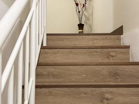 Modern interior view of a staircase featuring wooden steps Stock Photos