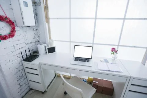 Modern interior workplace with laptop in white colors Fotos de archivo