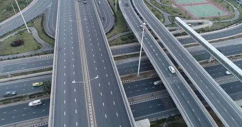 Modern intersection city road look down overhead view with vehicle movement Stock Footage 87328571