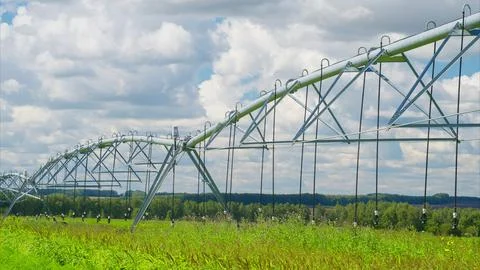 The Modern Irrigation System Implementation in Agricultural Landscapes Enhances Stock Photos